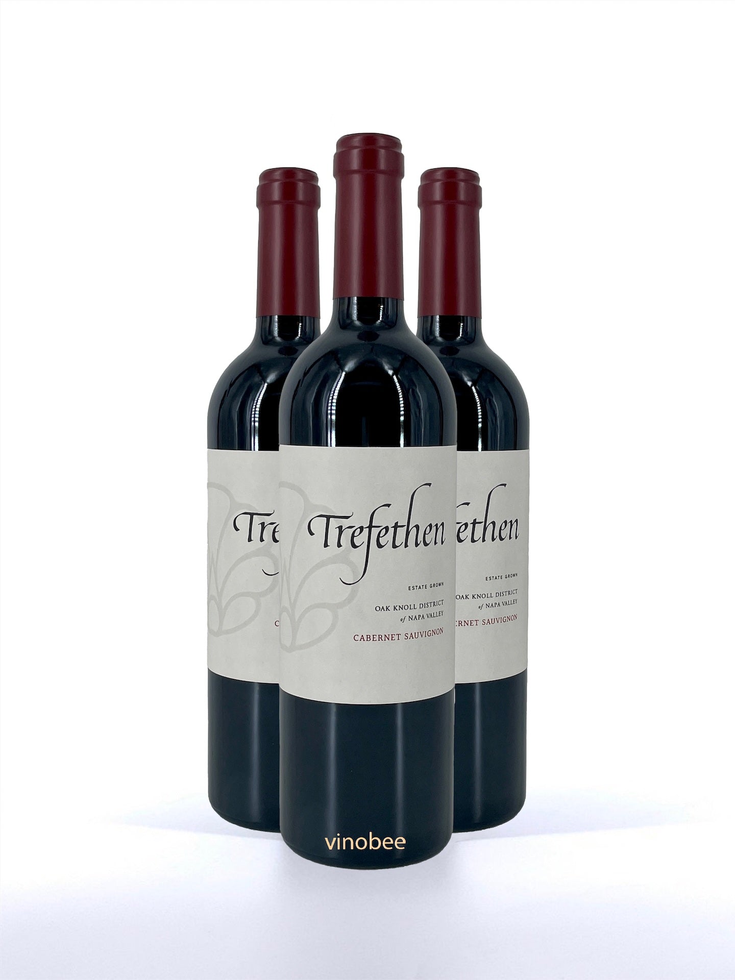 Three bottles of Tiefethen wine on a white background